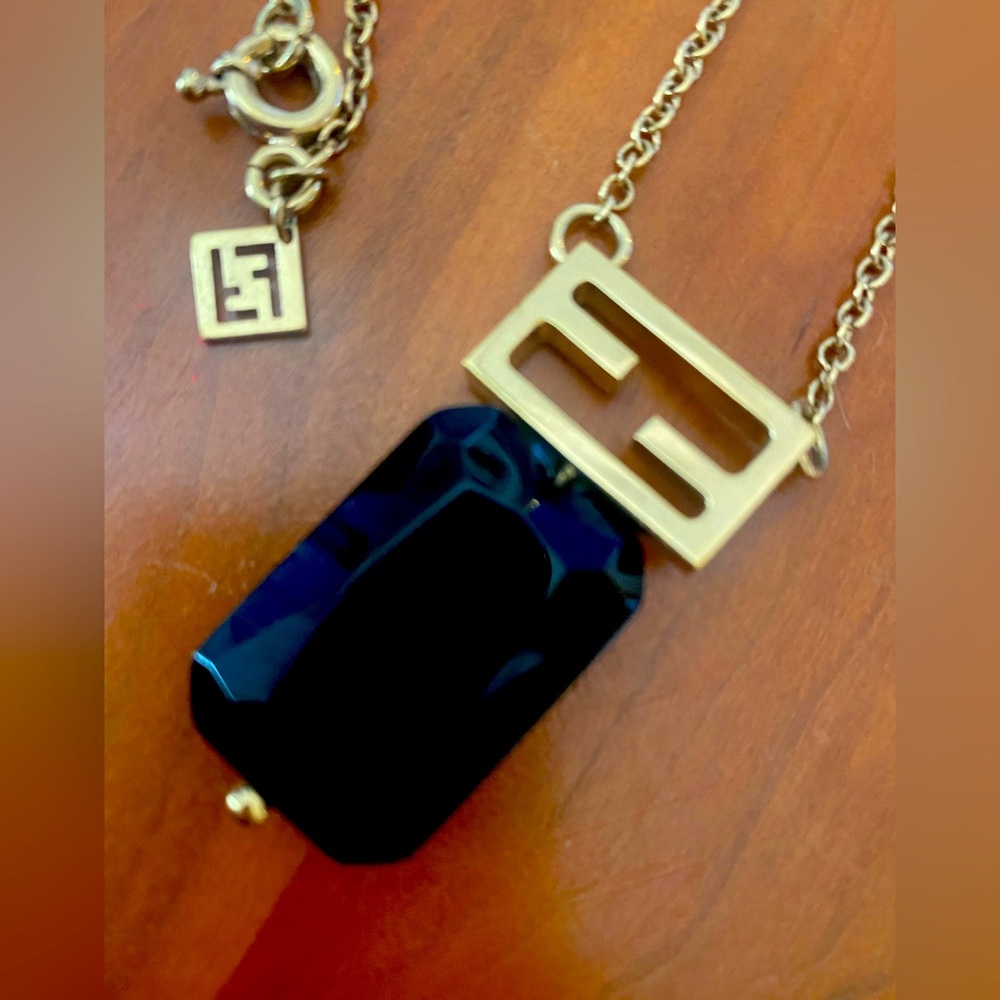 Extremely rare, vintage, gold tone, black stone Fendi necklace.